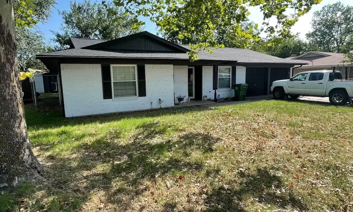 Professional roofing crew working on a residential roof in Tunkhannock